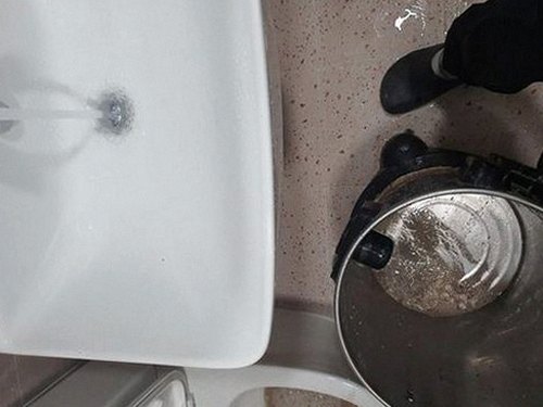 우이동 하수구막힘 배수 상태와 주변 정리 여부를 최종 확인하는 점검 장면